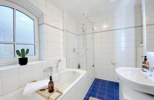 Snug Stays 1 I 3-Zimmer Design Apartment am See mit Garten I Home Office I Highspeed Wifi - Foto 7