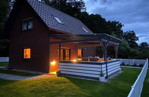 Strandhaus Mathea - ruhige Lage direkt am Fleesensee - Parkplatz, Kamin, Sauna - familienfreundlich - Foto 1