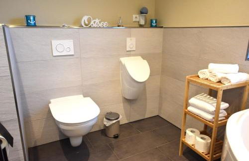 Bungalow Achtern Huus inkl 2x täglichen Eintritt StrandSPA Dahme - Foto 23