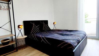 Indy Appart - T2 moderne - Eurexpo - Parking - Balcon vue - Calme Propre - Foto 4