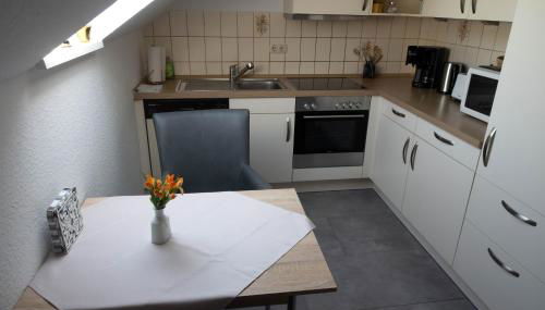 FeWo am Aper Tief mind 2 Nächte - Foto 3, stove, dishwasher