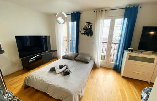 Cosy Appartement - 200m de Paris - Foto 17