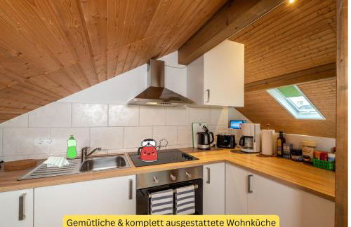 Holledau-Apartments - FeWo bis 5 Pers - getrennte Betten möglich - Vollausstattung - 24h Checkin - wöchentl Reinigung u Wäschewechsel - Waschmaschine u Trockner - WLAN - Minibar - XXL Parkplätze - Garten - ruhige Lage - Foto 44