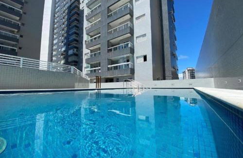 Apartamento Aconchegante e Elegante com Ar-Condicionado, Piscina, Garagem e Varanda Gourmet a 3 min da Praia - Photo 2