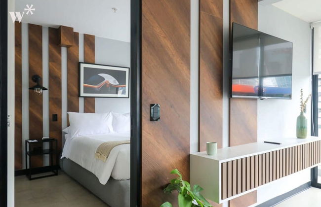 w Sleek 1BR in San Isidro - Photo 5