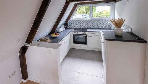 Rhön Apartments Ferienhaus Mondhäuschen - Foto 3, stove