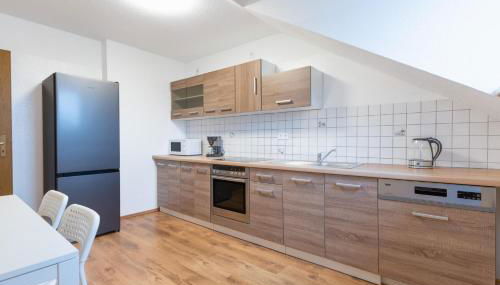 Duisburg - 2 Schlafzimmer Monteurwohnung - Vollausgestattete Küche - WIFI - Photo 3, stove, dishwasher, pet friendly, minibar