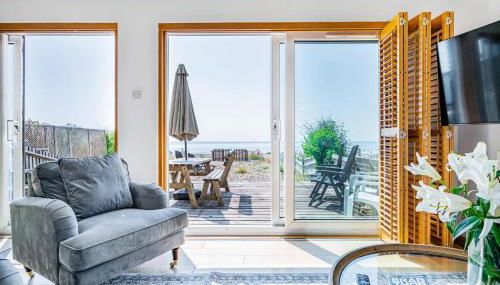 Pebble Paradise Beachfront Family Getaway - Foto 4