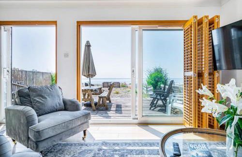 Pebble Paradise Beachfront Family Getaway - Foto 4