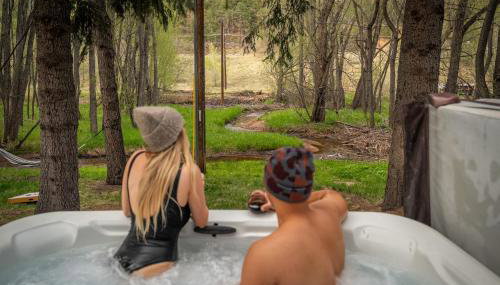 Serene Riverside Retreat with Sauna, Hot Tub, Fire Pit by Forest & Peak Retreats - Photo 1