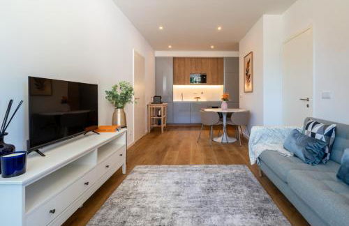 Sleek & Modern Flat w/ Private Garage by HostWise - Photo 19