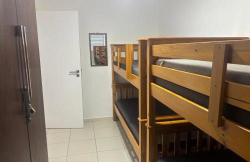 APTO FAMILIAR EM BERTIOGA JARDINS DO INDAIÁ A 500 M Praia - Foto 17