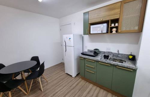 Ap10 Prático, confortável com wifi, piscina, rooftoop e academia em frente ao Metrô - Photo 15