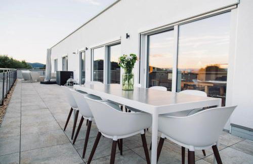 Exklusives Penthouse mit Whirlpool, Panoramaterrasse, Kino & Tischfußball für bis zu 8 Personen - Foto 31