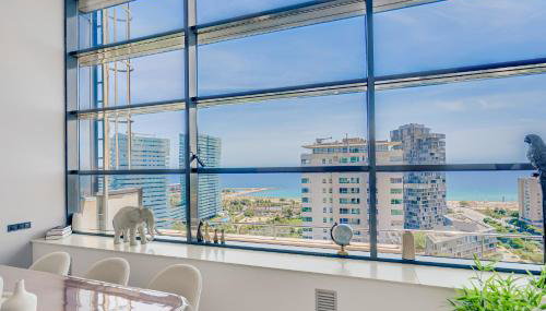 Penthouse Duplex with TOP Views! - Photo 3