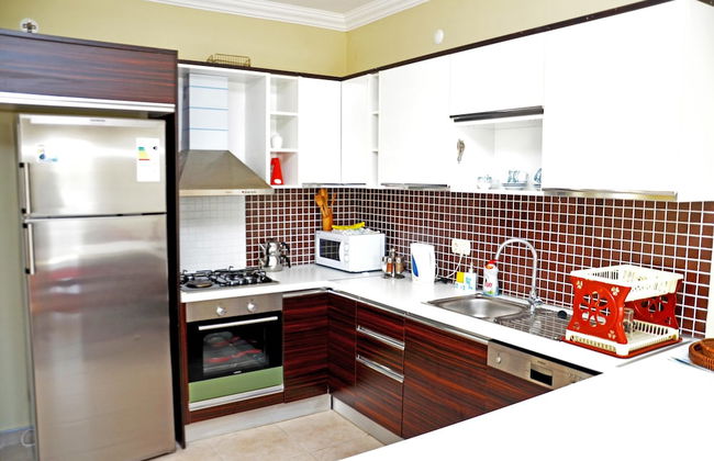 Sultan Homes Apartments - Photo 12