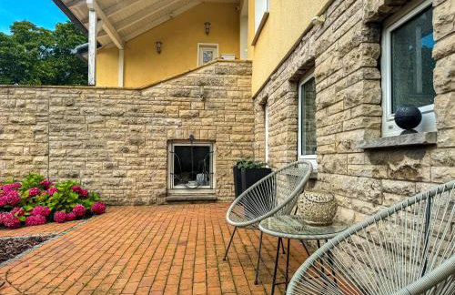 Souterrain Apartment mit eigenem Eingang und Terasse - Foto 11