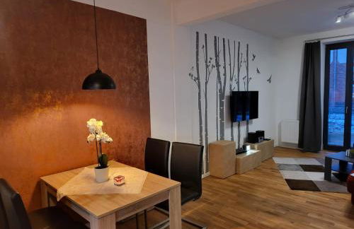 Trendige Stadtwohnung, historisches Haus mit Terrasse und Garten - Foto 1