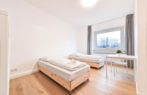 Tolstov Apartments - City Apartments with 1 or 2 Rooms - 15 Min to Messe DUS and Old Town DUS - Foto 7