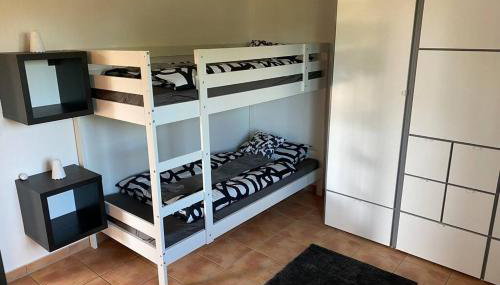 Das Schneckenhaus - Ferienwohnung mit Pool & Seeblick - Foto 4