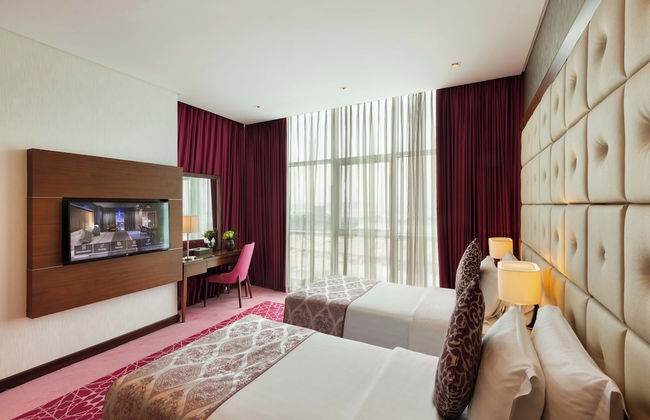 Royal Continental Suites - Photo 14