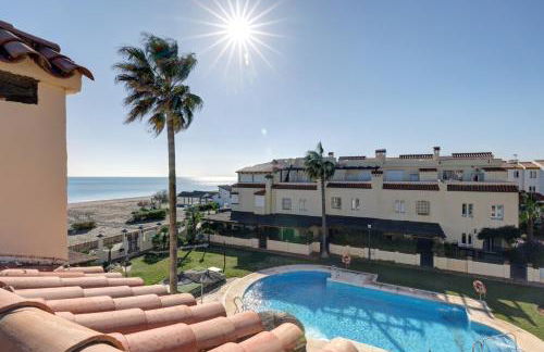 Luxury modern beachfront 3 bed gated community townhouse with pool, sun terrace, sea views close to all amenities - Photo 1