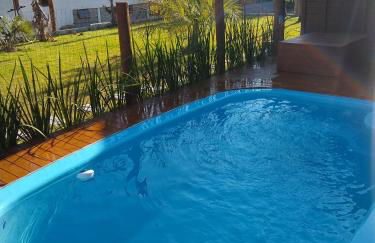 Chalés Praia do Rosa piscina compartilhada - Foto 67