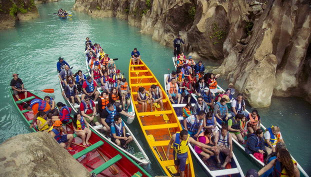 Canoeing towards Tamul Waterfall