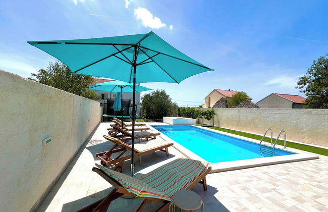 Holiday Home Mary with Pool - Photo 1