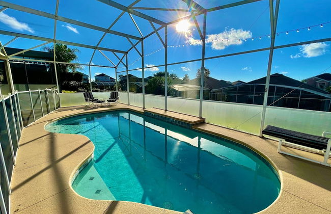 Grand Fabulous 4BR Pool Home Near Disney - Photo 31