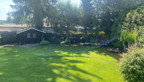 Ferienhaus in Wald und Seenähe - Foto 5, Garden view