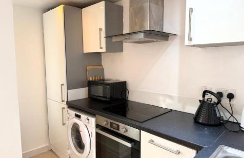 Central Brick Lane 2 Bedroom Flat - Private Patio - Foto 17
