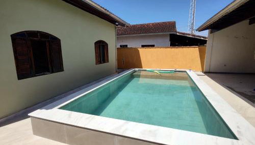 Casa piscina com ozônio churrasqueira perto da praia - Foto 1