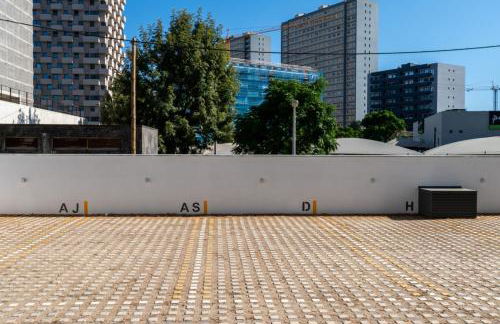 Sleek & Modern Flat w/ Private Garage by HostWise - Photo 33