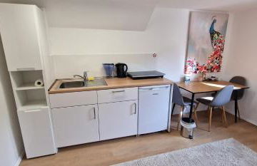 Modernes Untergeschoss-Apartment - Foto 1