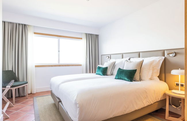 The Patio Suite Hotel - Photo 7