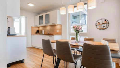 Hygge – Familienfreundliche Ferienwohnung mit Garten & Meerblick - Foto 3