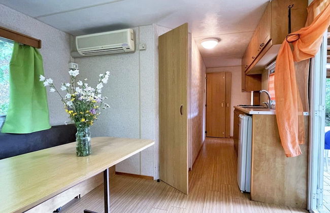 Pleasant Mobile Home in Toscana With Shared Pool - Photo 9