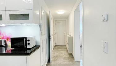 Luxury Wohnung mit Großem Bett und Schlafsofa Luxuriös Ausgestattet mit schöne Terrasse und Garten! - Foto 3