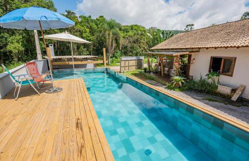 Casa Rústica com Piscina Privativa, Banheira de Hidromassagem, Ar-Condicionado, Pet friendly - Refúgio na Natureza a 5 Minutos do Centro de Imbituba, Perfeita para Famílias e Grupos - Photo 51