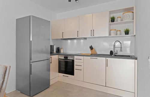 Roomfall Apartment am Kurpark mit TG & Wifi & Balkon - Foto 8