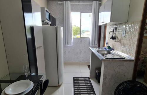 Kitnet203 centro, com linda vista janela, tv smart - Foto 4