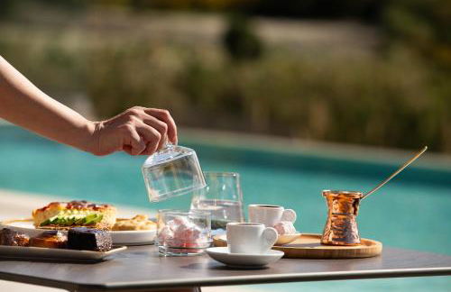 Reveli Suites - Photo 14