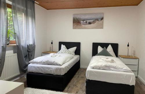 Appartio - Gästehaus "Dorfblick" - komfortable Ferienwohnungen mit Küche und Waschmaschine - Foto 1