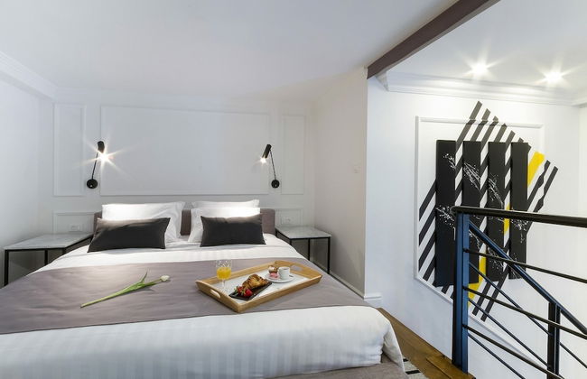 DeZign Apartments - Photo 13