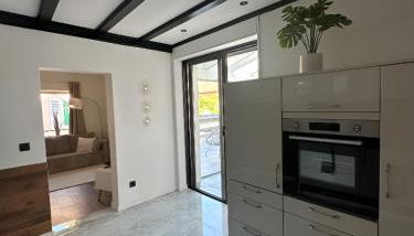 Charmante Ferienwohnung mit großer Dachterrasse & Wintergarten - Foto 5