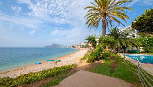 SOLETE - Apartamento con vistas, acceso directo al mar, piscina y parking by Redi - Photo 3, Garden