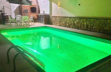 Belíssima Casa a Beira Mar com Piscina Aquecida Cobrado a Parte, 5 Quartos com Ar Condicionado, Amplo Salão de Jogos com Mesas de Bilhar e Pebolim, Amplo Espaço Externo com Churrasqueira em Deck Gourmet Coberto frente a Piscina,Tudo isso á Beira Mar - Photo 6