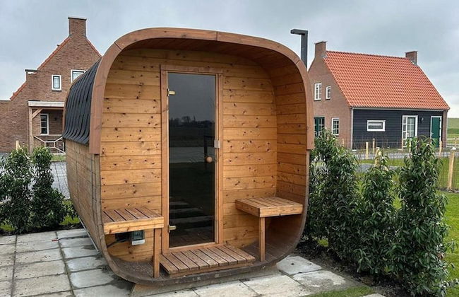 Villa With hot tub and Sauna, on a Holiday Park - Foto 19