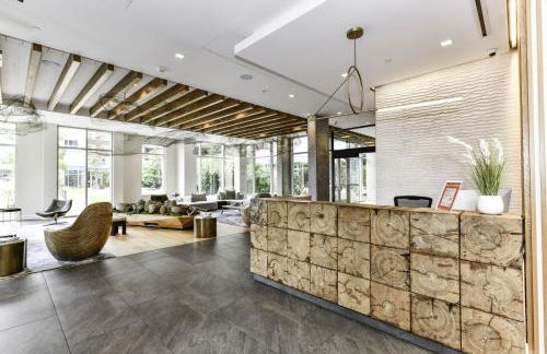 Comfy 2BR Oasis with Scenic Rooftop & Gym - Photo 30